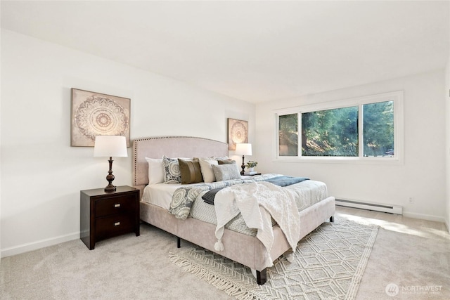 bedroom featuring carpet flooring, baseboards, and baseboard heating