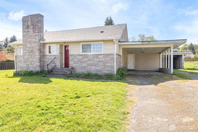 single story home featuring a chimney, an attached carport, dirt driveway, stone siding, and a front lawn