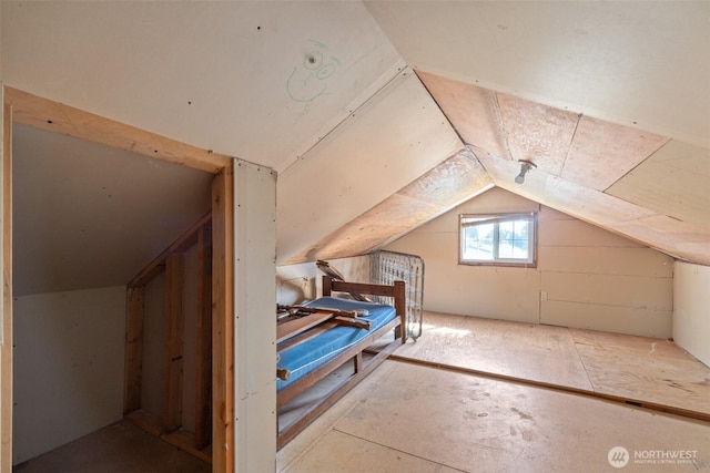 bonus room featuring lofted ceiling