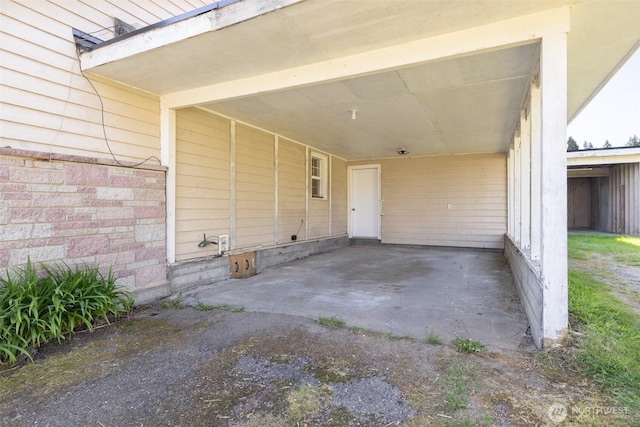 exterior space with an attached carport