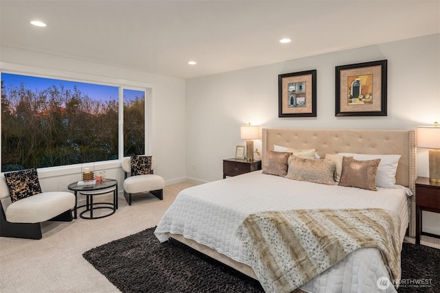 carpeted bedroom featuring recessed lighting and baseboards