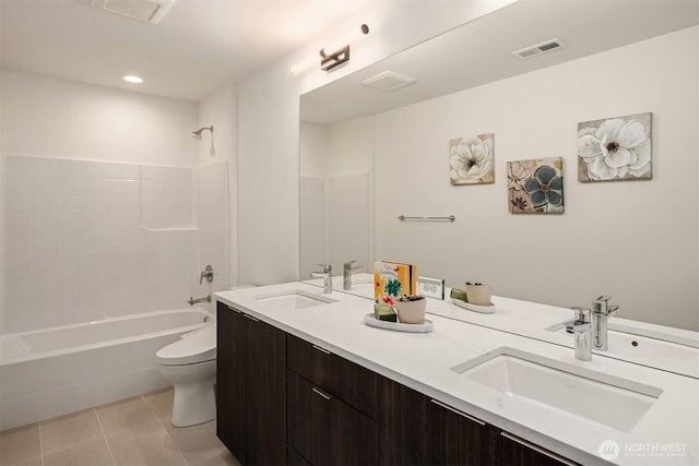 full bathroom featuring visible vents, double vanity, and a sink