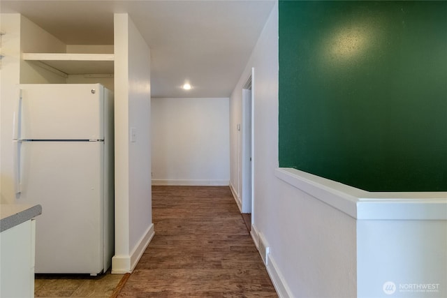 122 W Dayton Ave, Dayton, WA 99328 - hallway with wood finished floors, baseboards, and recessed lighting
