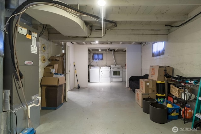 122 W Dayton Ave, Dayton, WA 99328 - unfinished below grade area featuring independent washer and dryer and heating unit