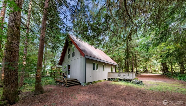 18016 Glacier Rim Dr, Glacier, WA 98244 - view of property exterior featuring a wooden deck and metal roof