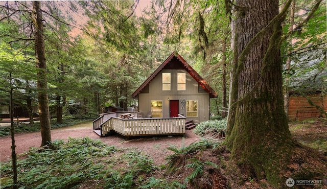 18016 Glacier Rim Dr, Glacier, WA 98244 - rear view of house with a wooden deck and a view of trees