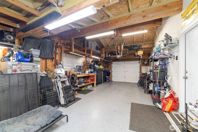garage with a workshop area