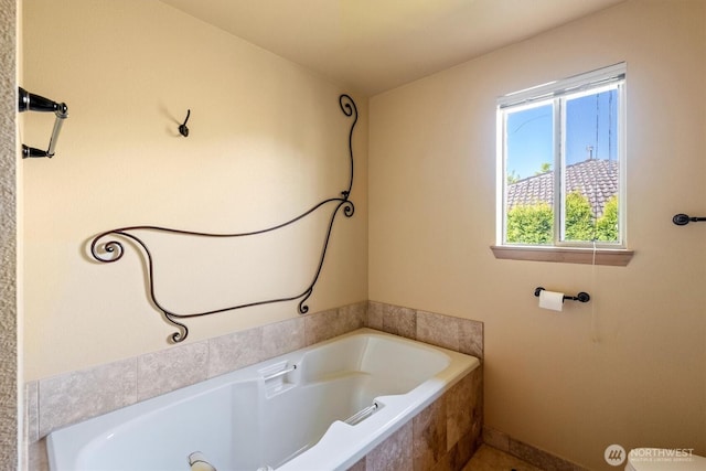 bathroom featuring a garden tub