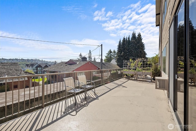 view of patio / terrace with a balcony