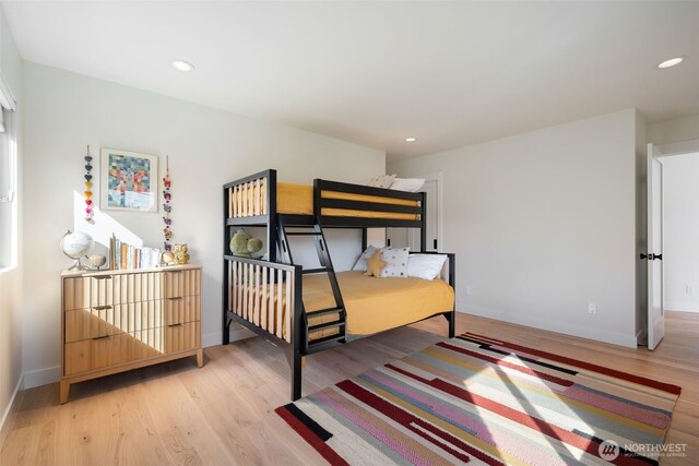 bedroom featuring recessed lighting, baseboards, and light wood-style floors