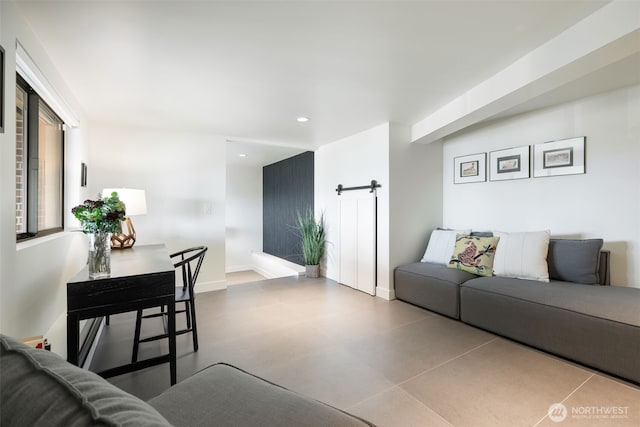 living area with recessed lighting and baseboards