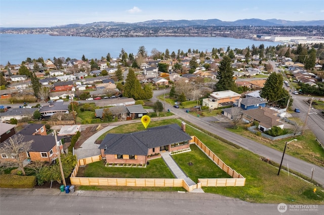 aerial view with a residential view and a water and mountain view