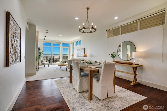 dining room with recessed lighting, baseboards, a chandelier, and hardwood / wood-style flooring