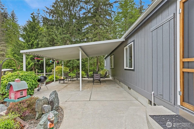 view of patio / terrace with an attached carport