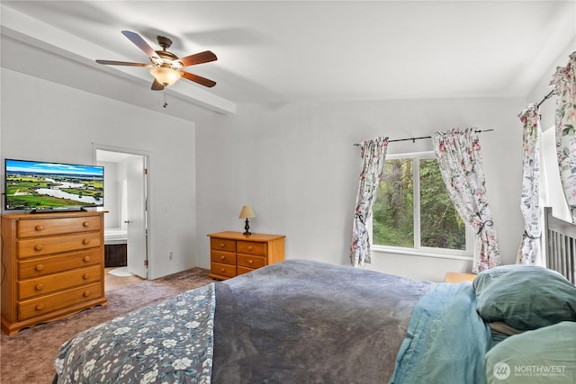 carpeted bedroom with ceiling fan and ensuite bath
