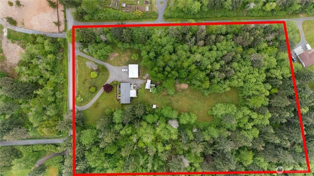 aerial overview of property's location with property parcel outlined