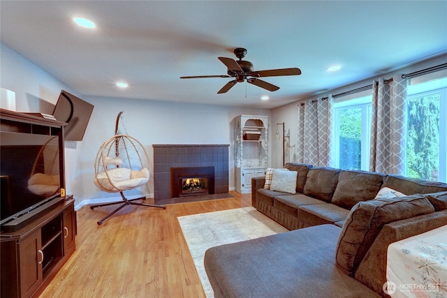 4204 Arbordale Ave W, University Place, WA 98466 - living room with light wood-style floors, a fireplace, a ceiling fan, recessed lighting, and baseboards