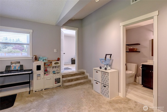 4204 Arbordale Ave W, University Place, WA 98466 - rec room with light colored carpet and a textured ceiling