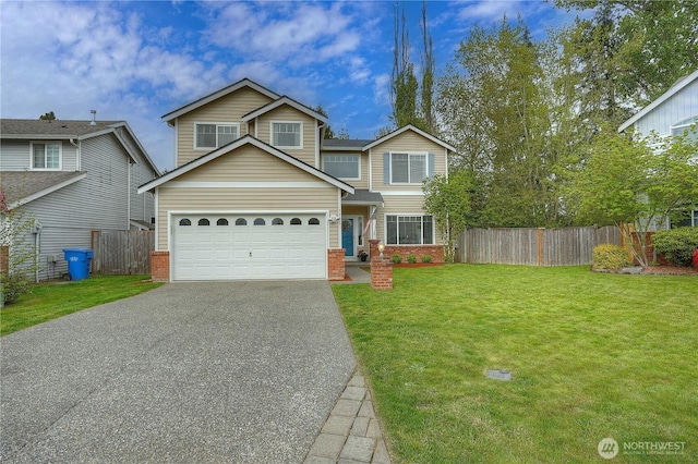 view of front facade with fence, driveway, brick siding, and a front yard