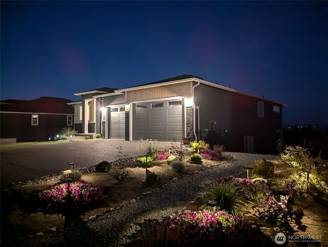 5423 Lonicera Dr, Blaine, WA 98230 - view of front of home with an attached garage, driveway, and stucco siding