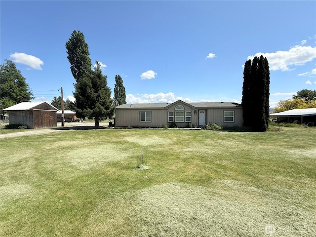 84 Weatherstone Rd, Omak, WA 98841 - rear view of property with a yard