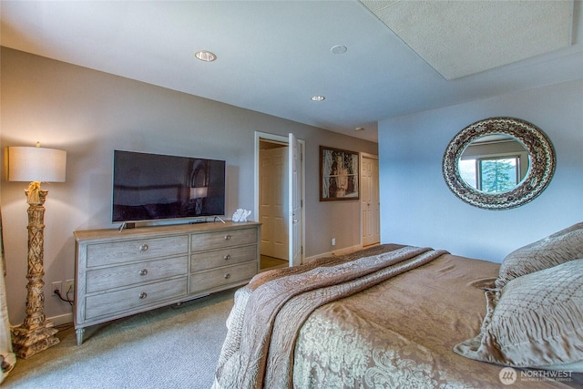 bedroom featuring baseboards, recessed lighting, and carpet