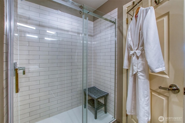 bathroom with a stall shower