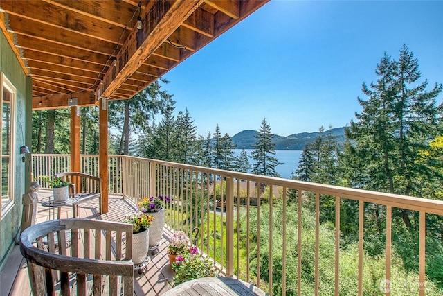 balcony featuring a mountain view