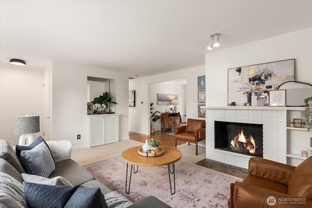 15510 NE 59th St, Redmond, WA 98052 - carpeted living area with a fireplace