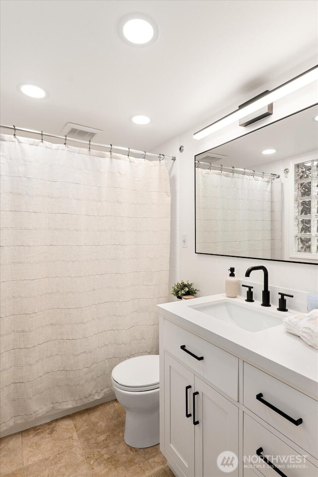 15510 NE 59th St, Redmond, WA 98052 - full bath with recessed lighting, visible vents, toilet, and vanity