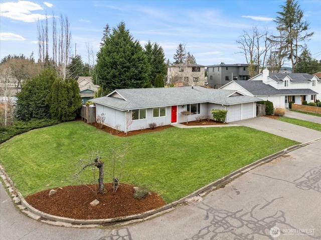 15510 NE 59th St, Redmond, WA 98052 - single story home featuring fence, a residential view, concrete driveway, a front yard, and a garage
