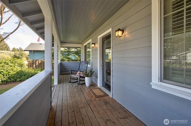 wooden deck featuring a porch