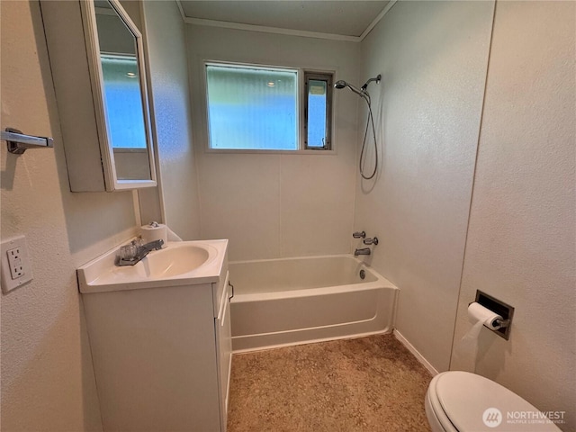 bathroom featuring toilet, vanity, crown molding, baseboards, and shower / bathing tub combination