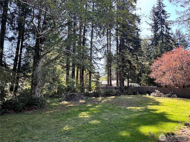 view of yard with fence