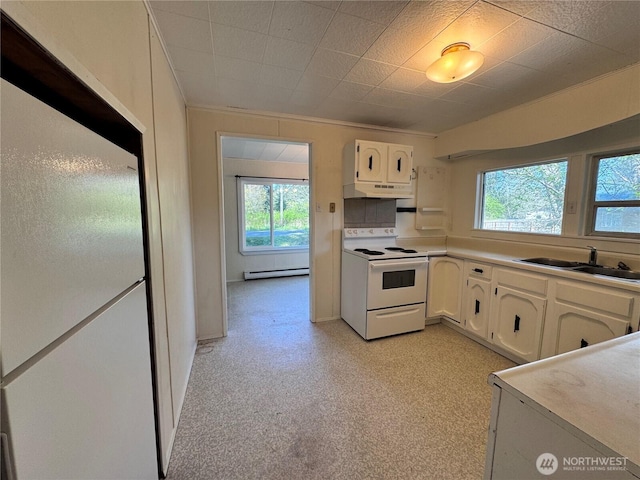 kitchen with white electric range oven, baseboard heating, white cabinetry, and a sink
