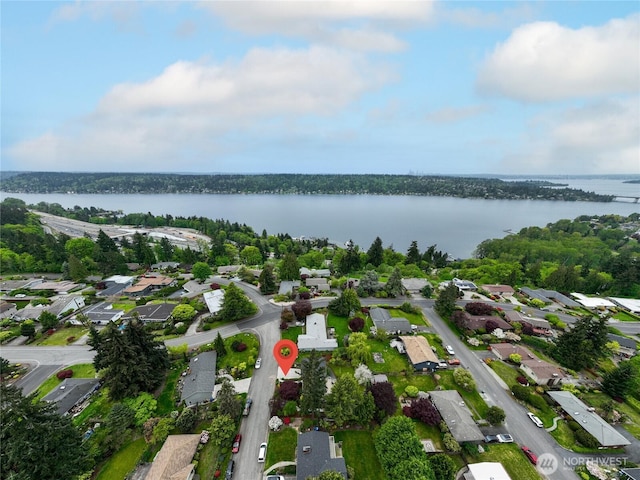 bird's eye view featuring a residential view and a water view