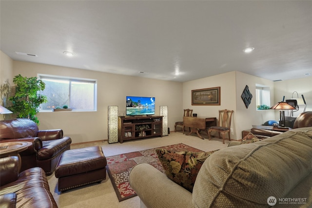 carpeted living room with baseboards and recessed lighting