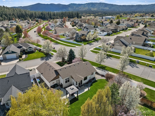 bird's eye view featuring a mountain view and a residential view