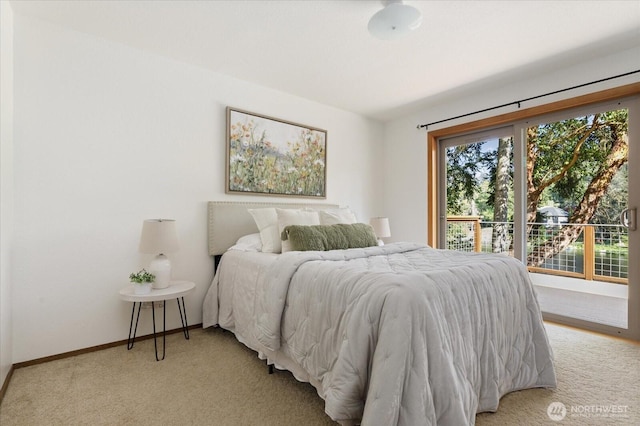 carpeted bedroom with baseboards