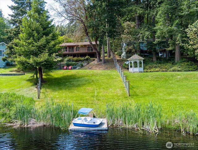 1069 Honeymoon Lake Dr, Greenbank, WA 98253 - dock featuring a gazebo, a lawn, and a water view