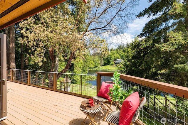 1069 Honeymoon Lake Dr, Greenbank, WA 98253 - deck with view of wooded area
