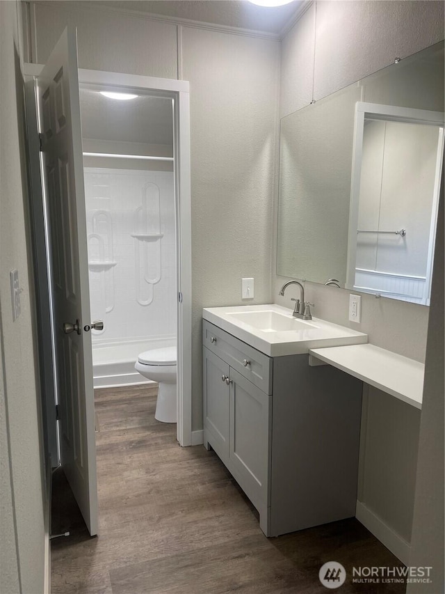 611 Cedar Ave Unit 33, Port Hadlock, WA 98339 - bathroom with wood finished floors, walk in shower, toilet, and vanity