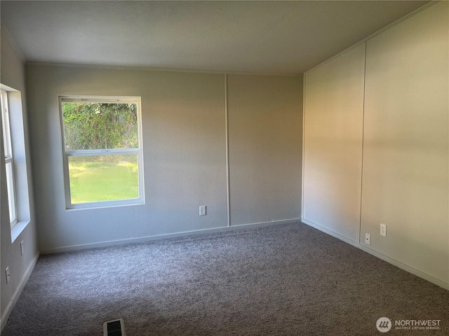 611 Cedar Ave Unit 33, Port Hadlock, WA 98339 - carpeted spare room with visible vents and baseboards