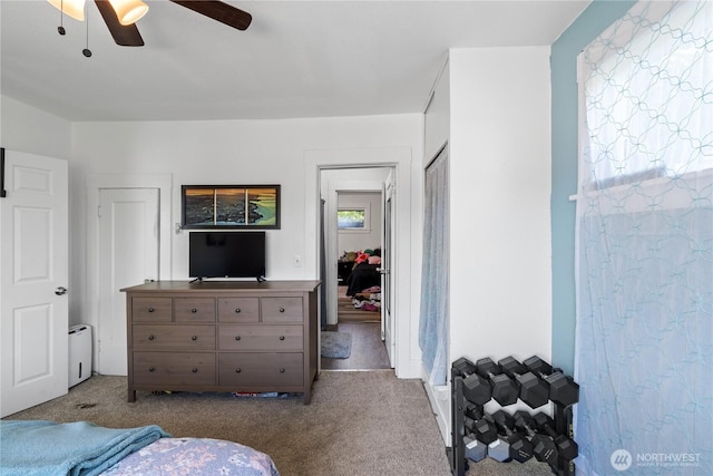 bedroom featuring a ceiling fan and carpet flooring