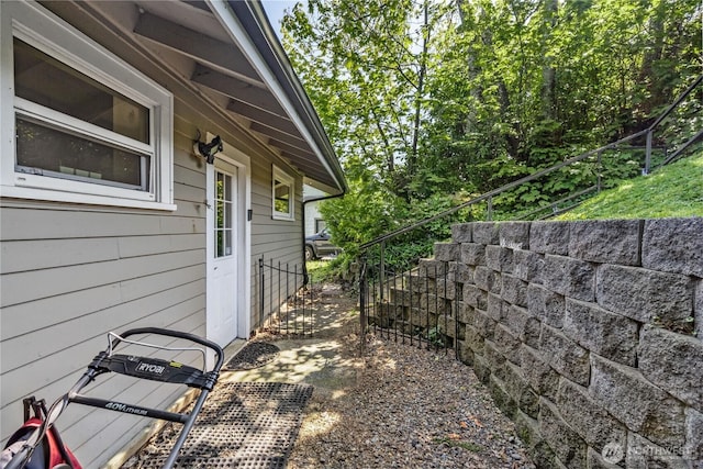 view of side of property with fence