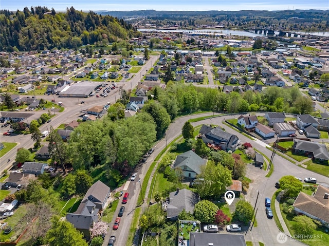 birds eye view of property with a residential view