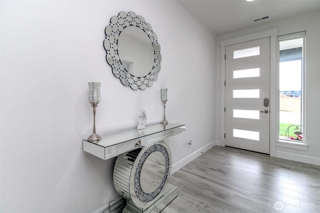 6318 230th Avenue Ct E, Buckley, WA 98321 - foyer featuring baseboards, visible vents, and plenty of natural light