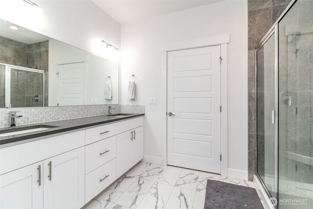 6318 230th Avenue Ct E, Buckley, WA 98321 - bathroom featuring double vanity, marble finish floor, a stall shower, and a sink
