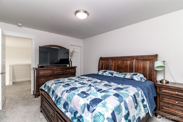 6318 230th Avenue Ct E, Buckley, WA 98321 - bedroom with baseboards and light carpet