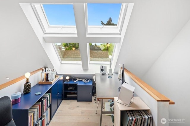 2305 E Alder St, Seattle, WA 98122 - interior space featuring a skylight, a high ceiling, and light wood finished floors